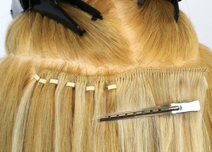 hairweave met microringen laten plaatsen